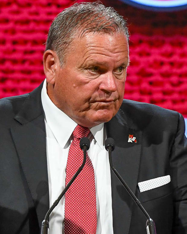 Razorbacks coach Sam Pittman at the podium on the main stage at SEC Media Days